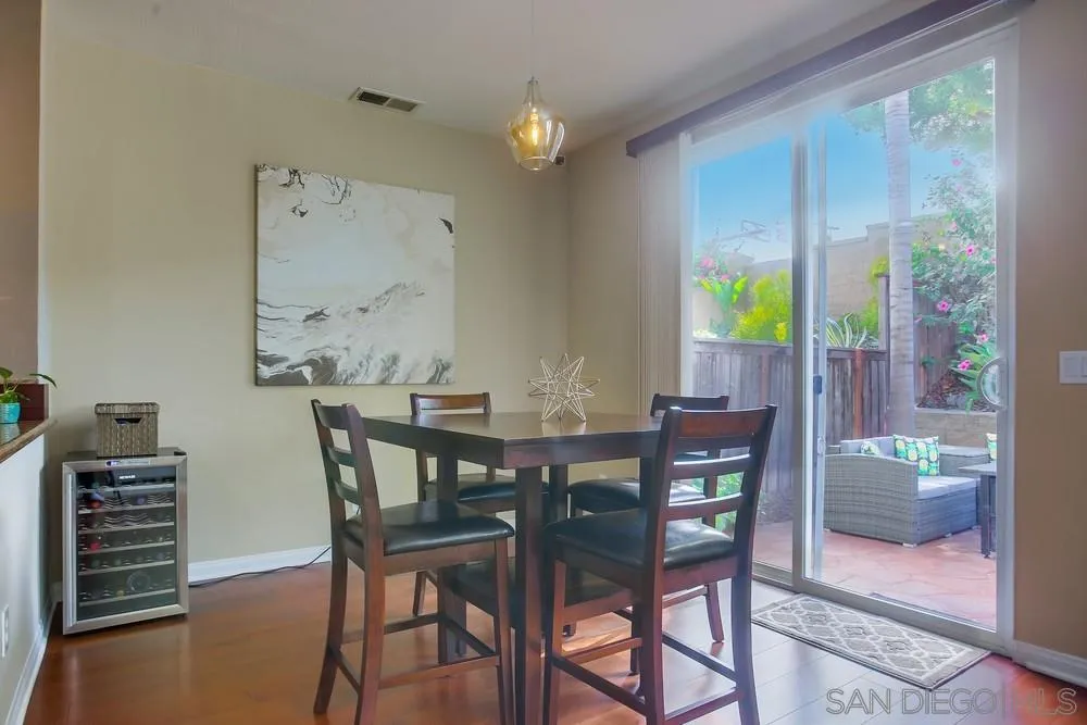 4115 Karst Road Carlsbad, CA 92010 - Photo 5 of 43 a view of a dining room with furniture and a window
