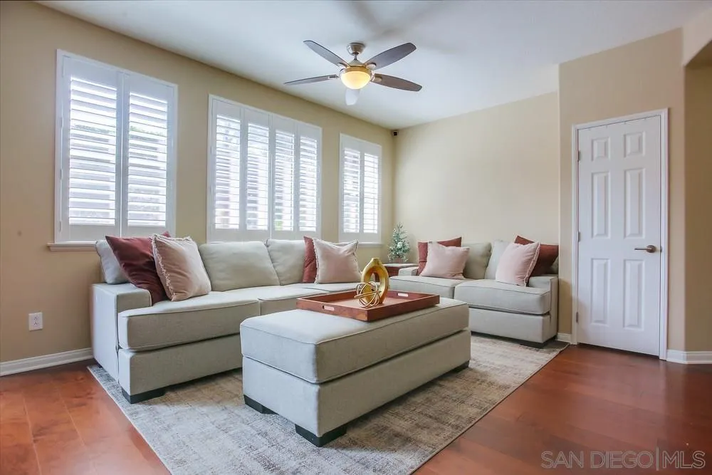 4115 Karst Road Carlsbad, CA 92010 - Photo 9 of 43 a living room with furniture and a large window