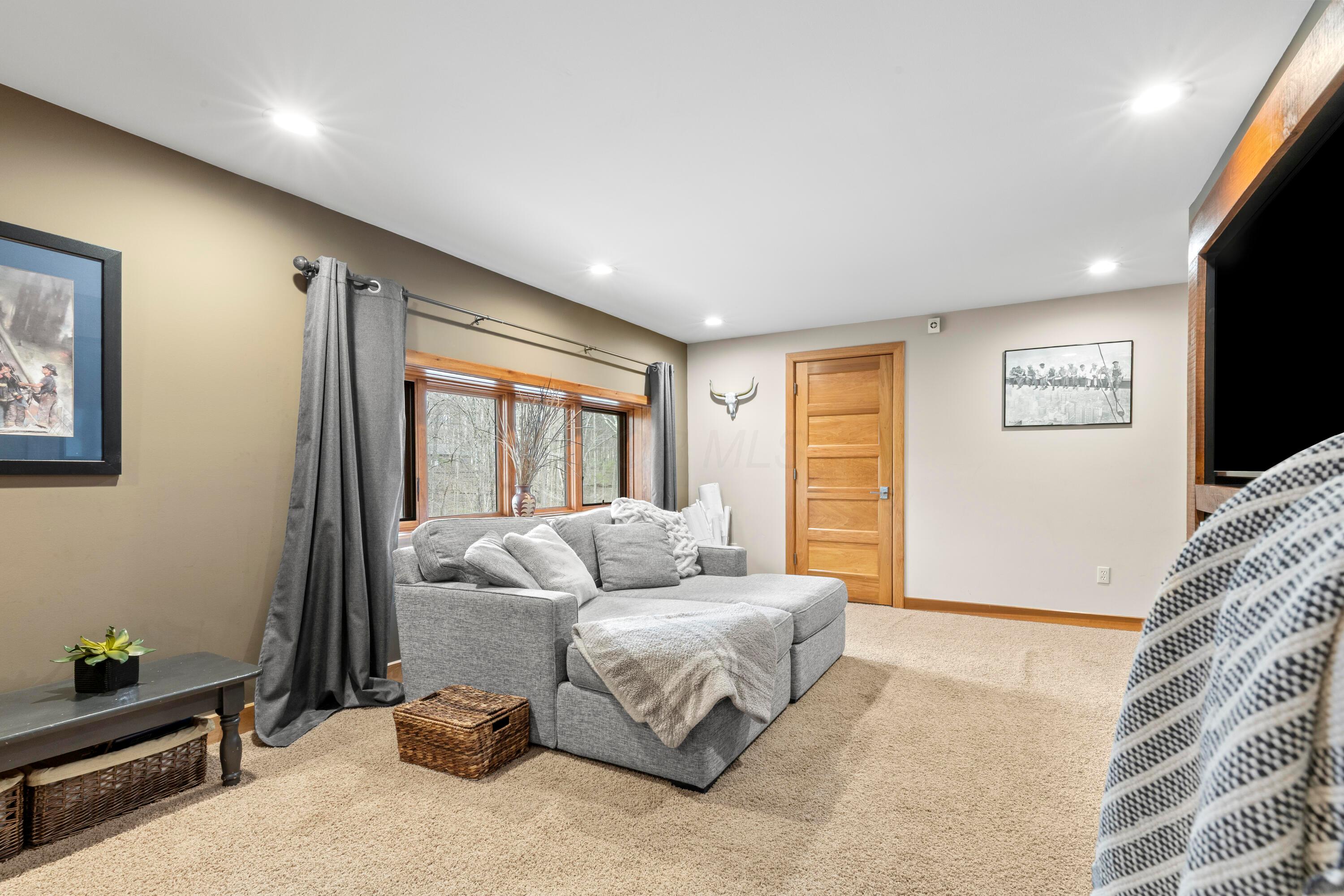 7860 Schott Road Westerville, OH 43081 - Photo 48 of 71 47. Lower Level Rec Room 1