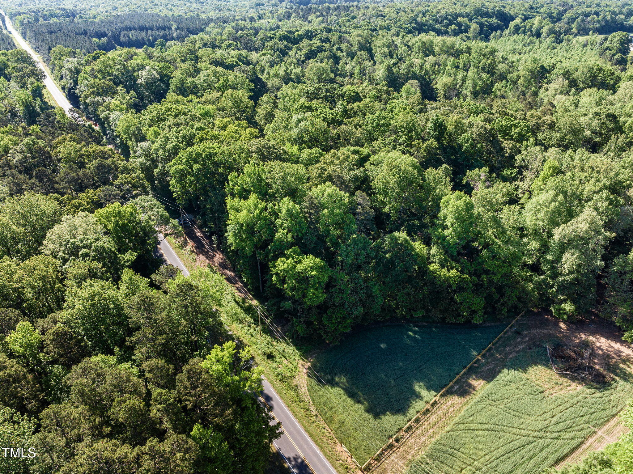 Lot 3 Helena Moriah Road Timberlake, NC 27583 - Photo 7 of 7 an aerial view of residential houses with outdoor space and trees