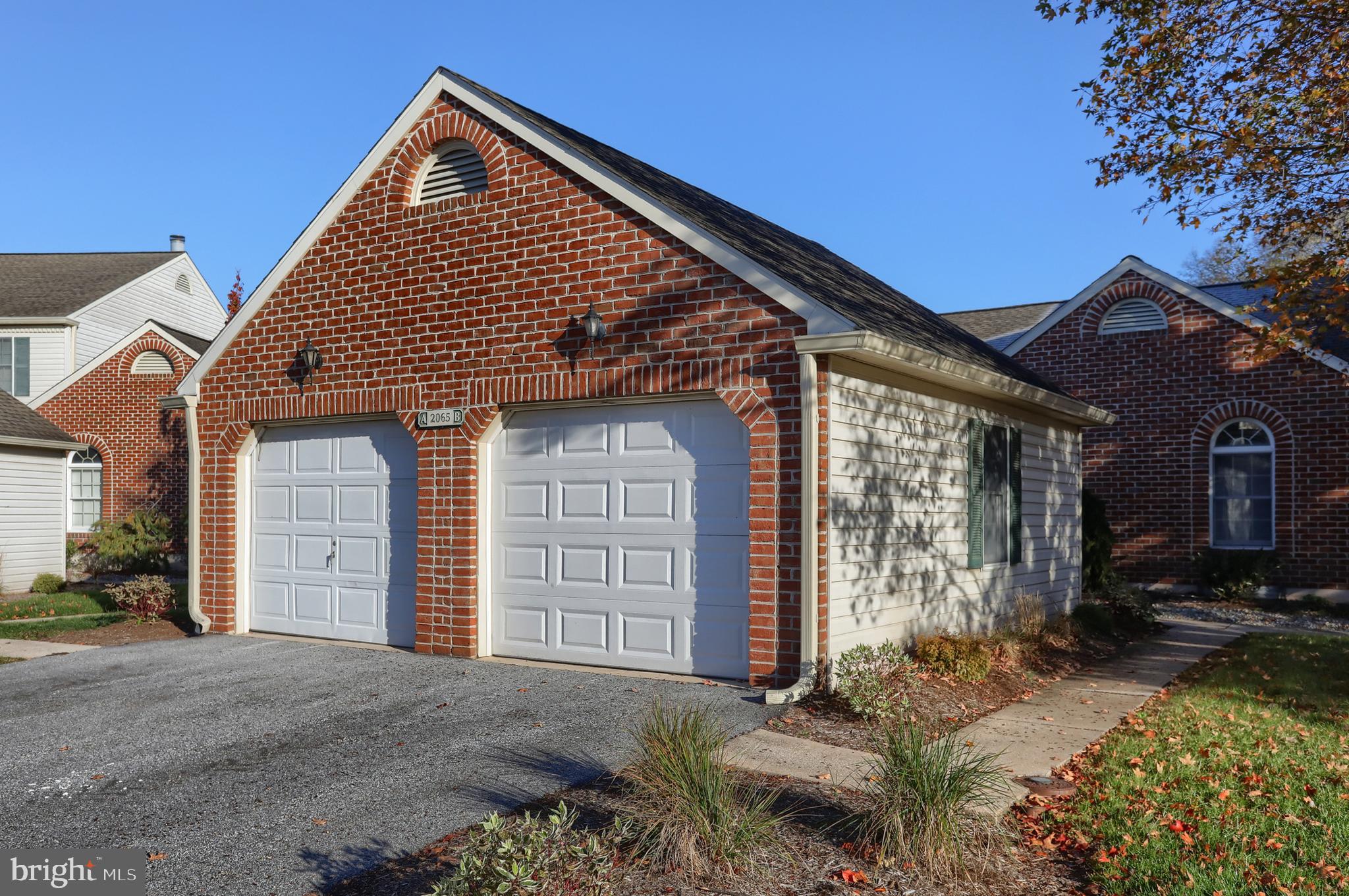 2065 Raleigh Road, Unit B Hummelstown, PA 17036 - Photo 36 of 40 a front view of a house with a yard