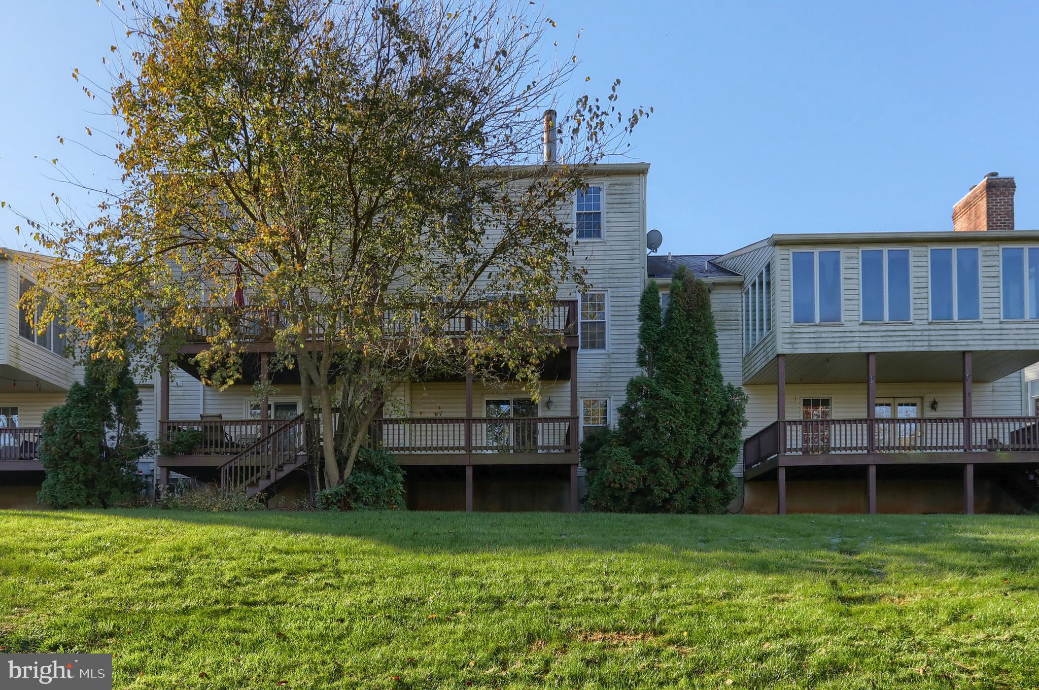 2065 Raleigh Road, Unit B Hummelstown, PA 17036 - Photo 40 of 40 a view of a house with backyard and sitting area