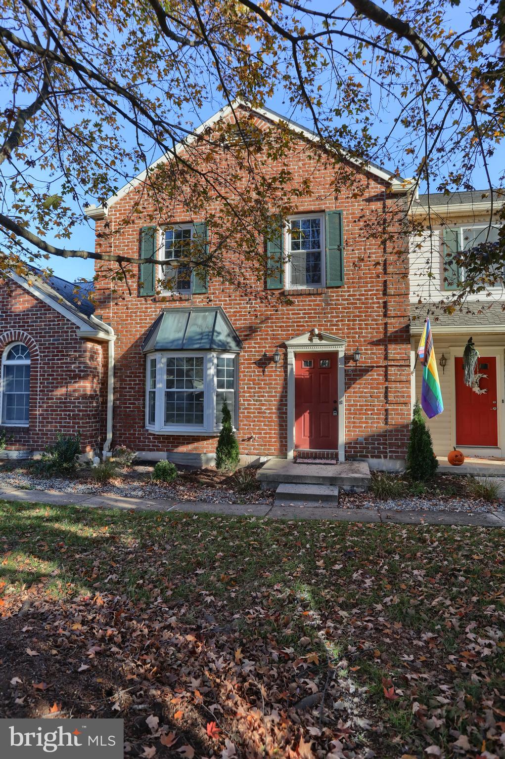 2065 Raleigh Road, Unit B Hummelstown, PA 17036 - Photo 6 of 40 a front view of a house with garden