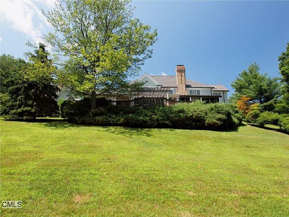 1185 Smith Ridge Road New Canaan, CT 06840 - Photo 9 of 17 a house view with a outdoor space