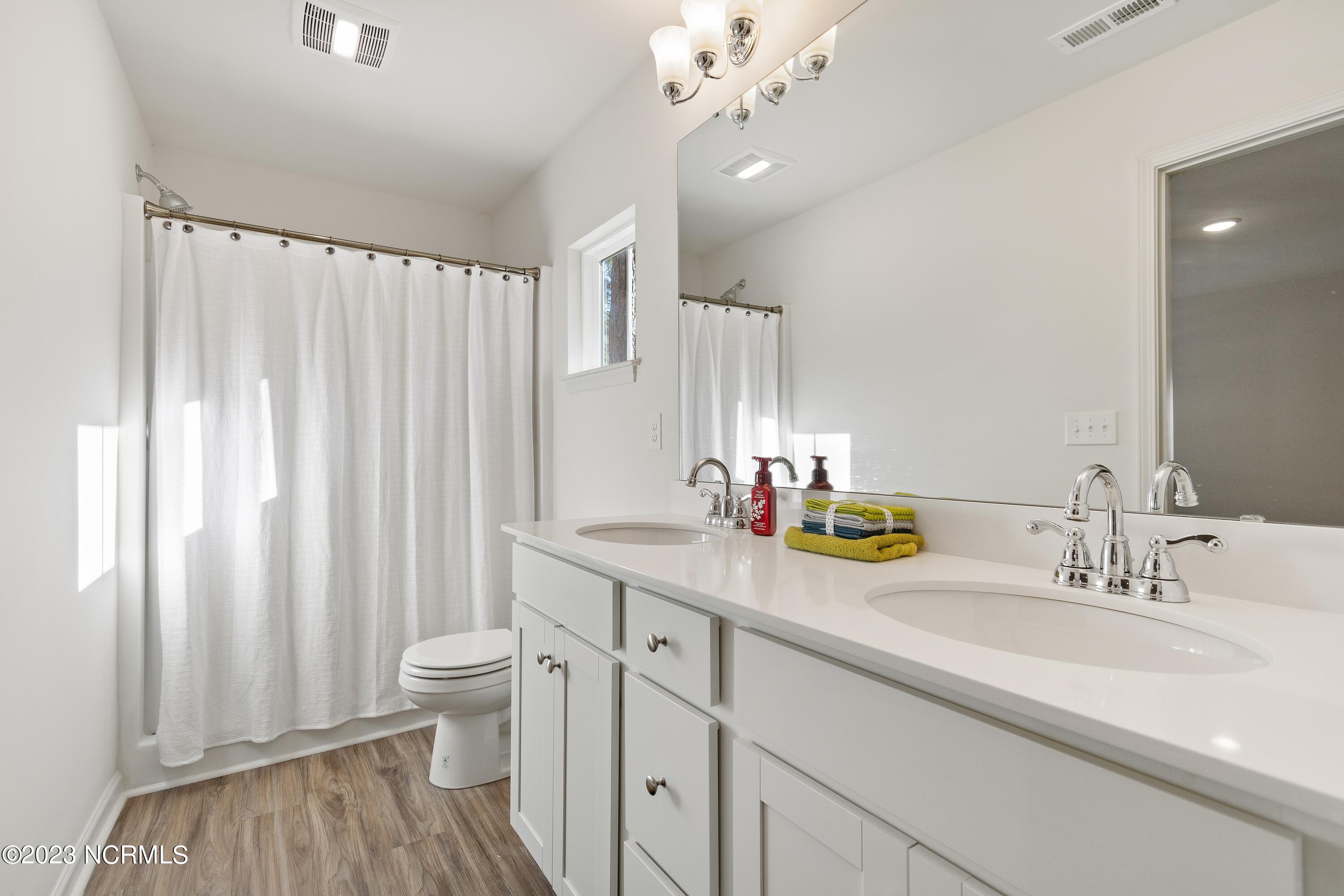 860 Village Point Road Southwest Shallotte, NC 28470 - Photo 12 of 28 Guest Bathroom