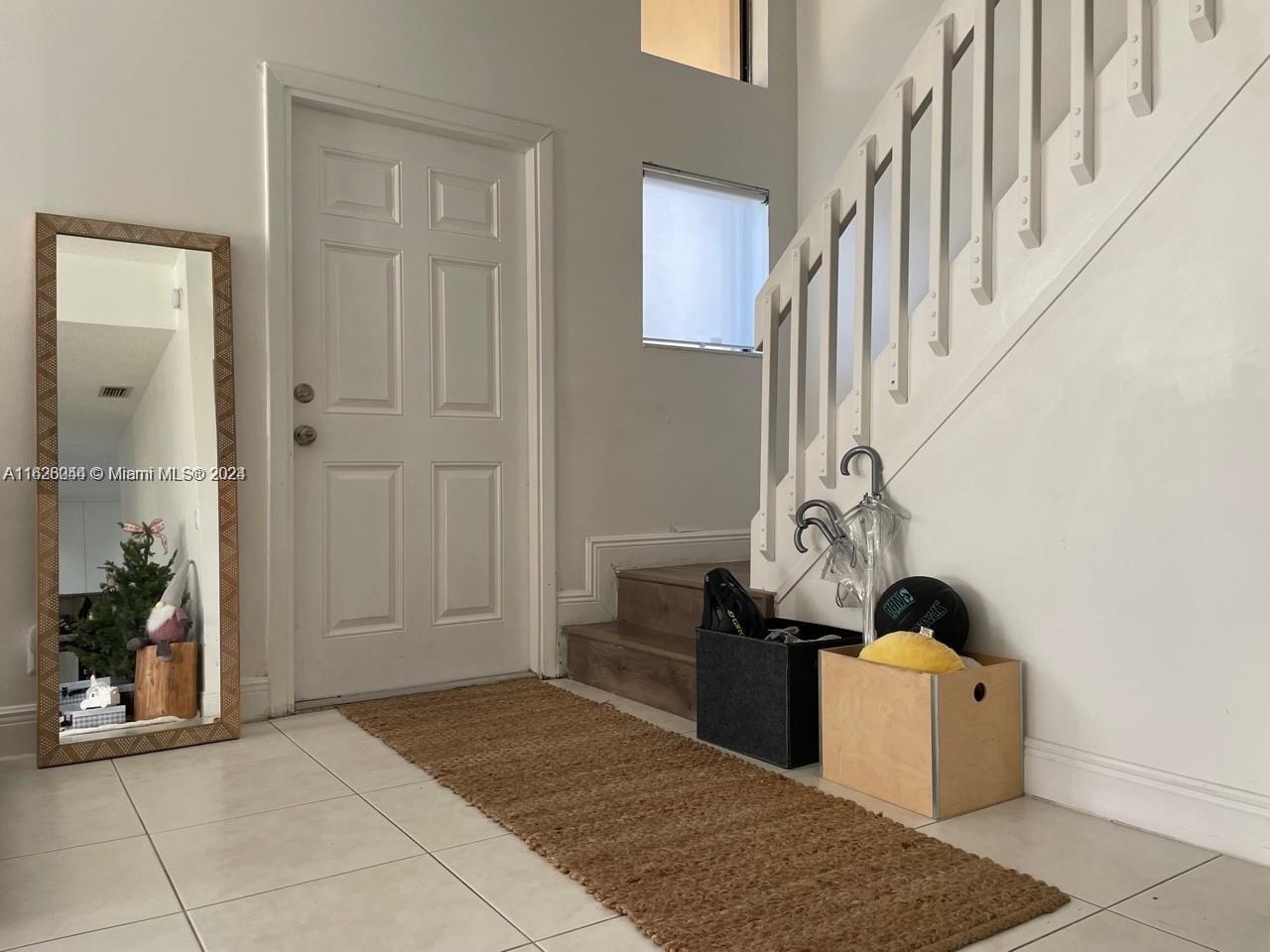 501 Racquet Club Road, Unit 63 Weston, FL 33326 - Photo 2 of 14 a view of a storage & utility room