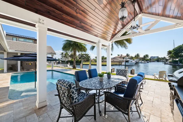 a outdoor space with lots of table and chairs