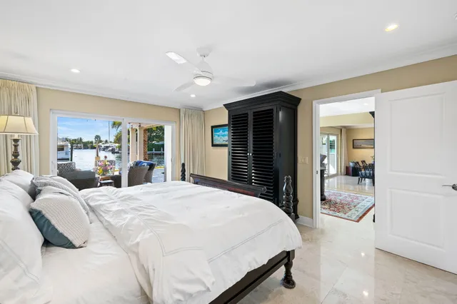 a bathroom with a granite countertop sink mirror and shower