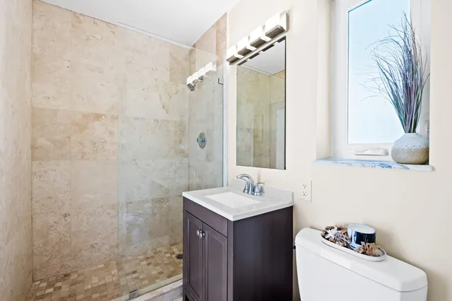 a view of a hallway with washer and dryer