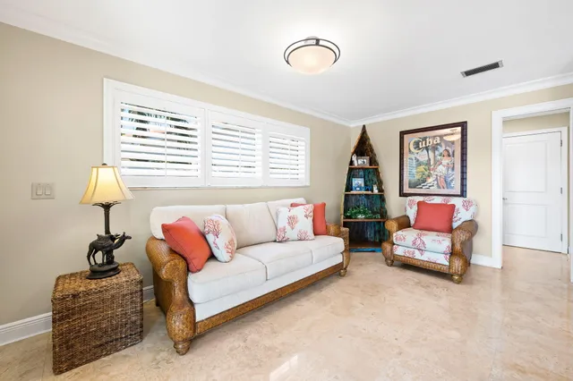 an aerial view of a house with outdoor space