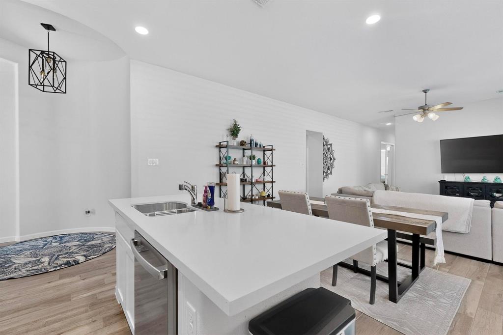 2319 Kirkstall Way Forney, TX 75126 - Photo 11 of 29 a view of a dining room with furniture