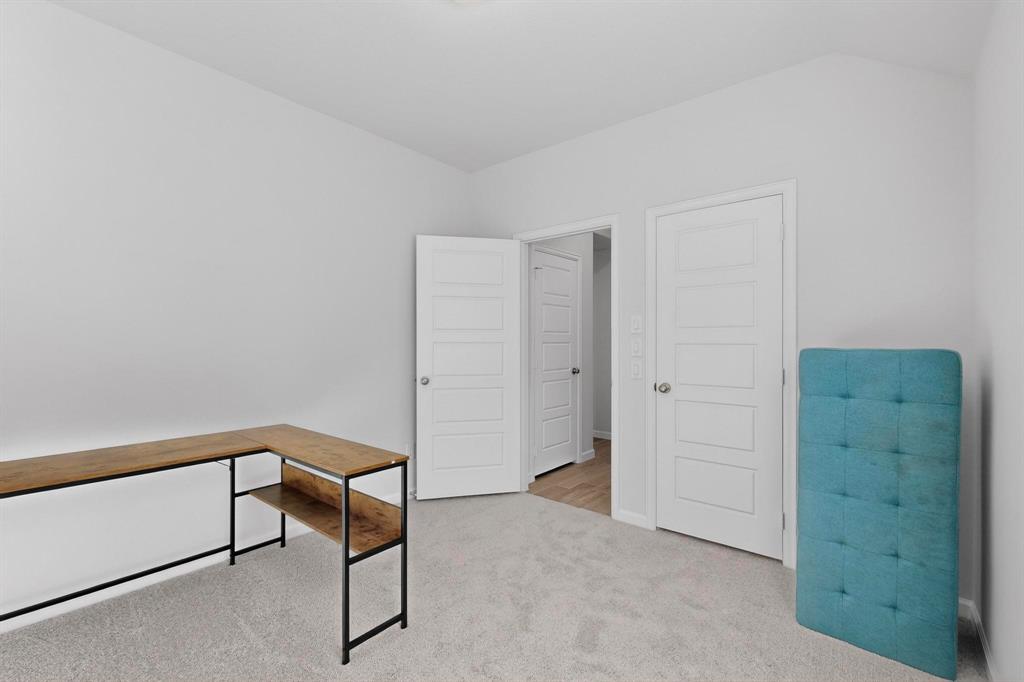 2319 Kirkstall Way Forney, TX 75126 - Photo 20 of 29 a view of a hallway with closet