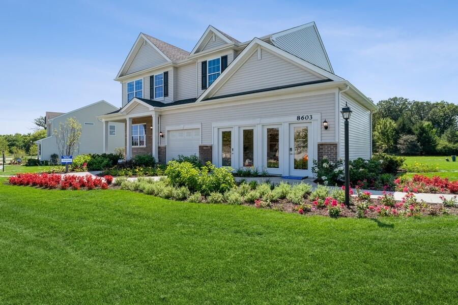 11290 Green Place Winfield, IN 46307 - Photo 13 of 27 a front view of a house with a yard