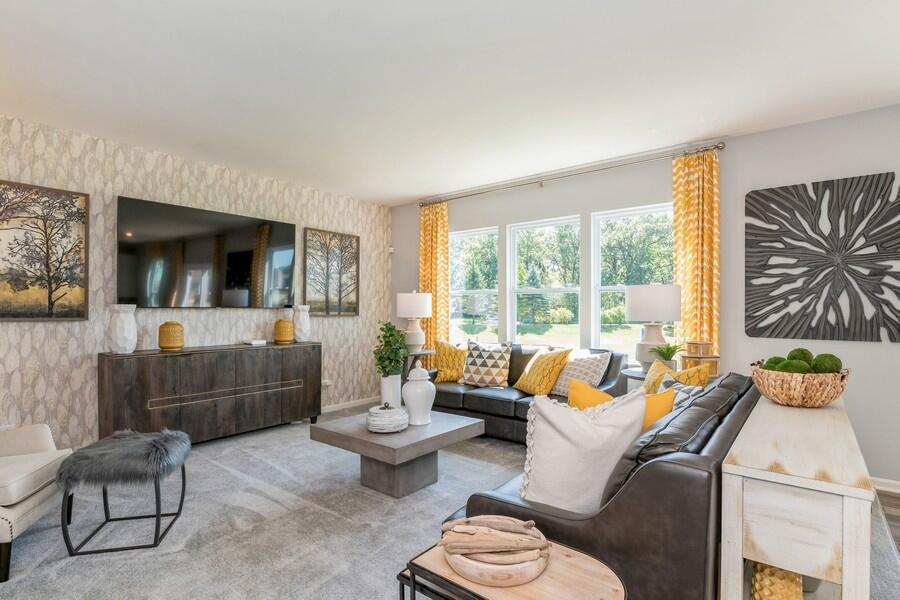 11290 Green Place Winfield, IN 46307 - Photo 18 of 27 a living room with furniture and a flat screen tv