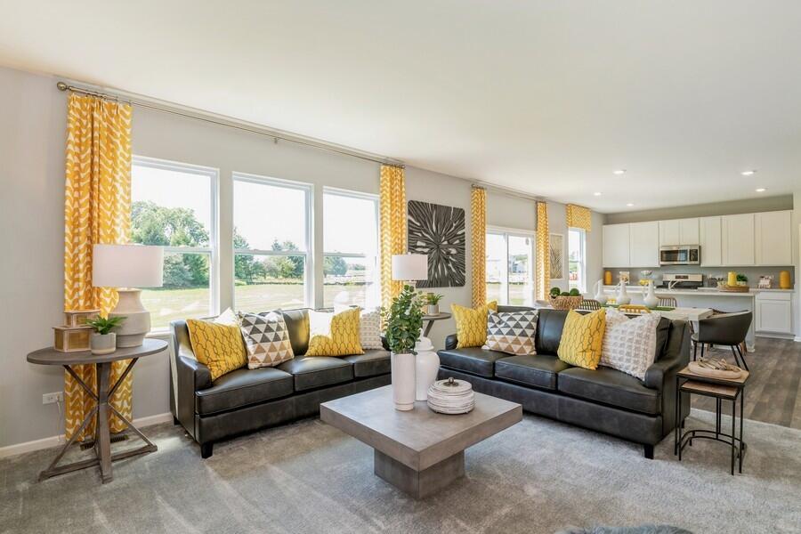 11290 Green Place Winfield, IN 46307 - Photo 19 of 27 a living room with furniture and a large window