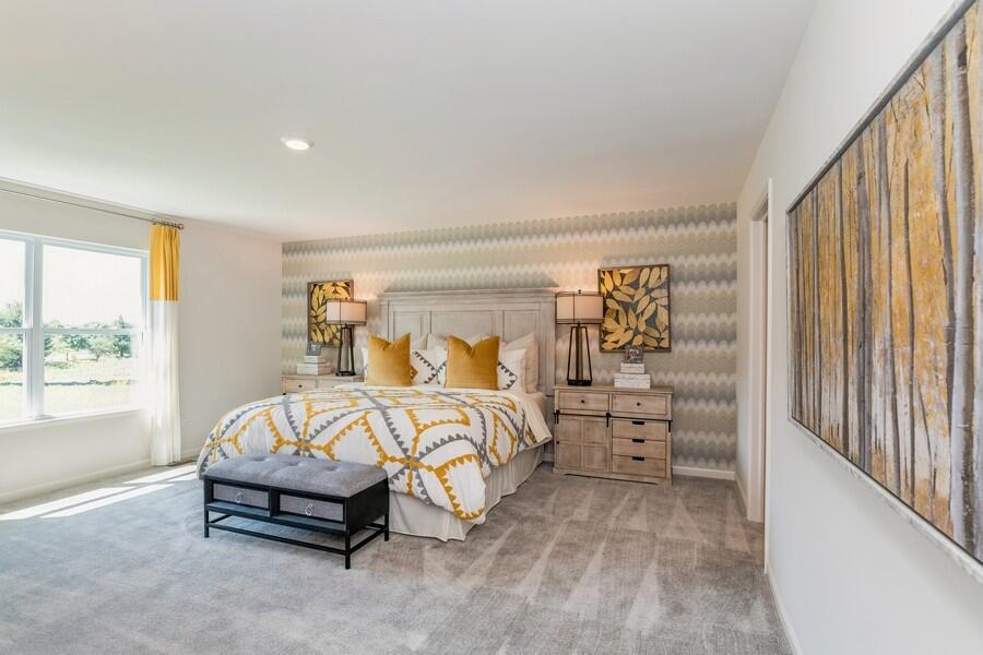 11290 Green Place Winfield, IN 46307 - Photo 22 of 27 a bedroom with a bed and large window