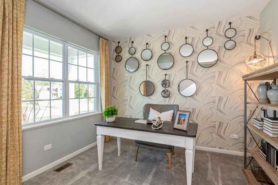 11290 Green Place Winfield, IN 46307 - Photo 5 of 27 a view of a workspace with furniture and a window