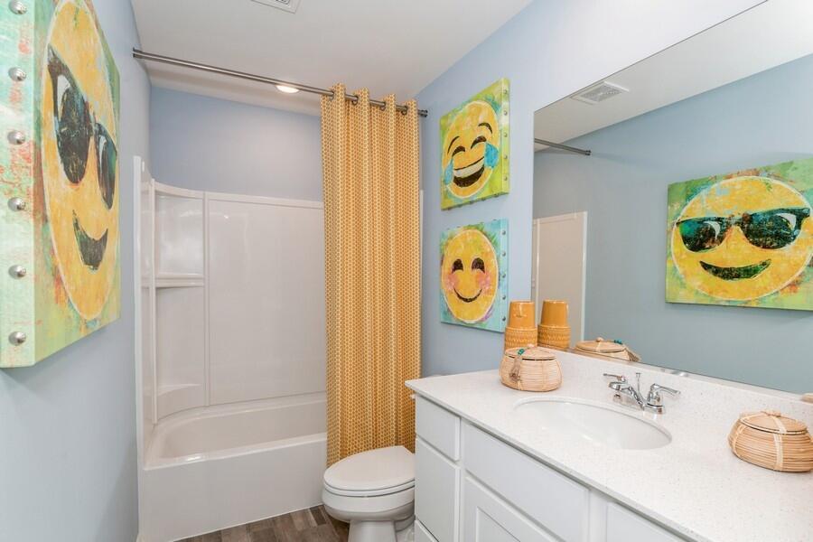 11290 Green Place Winfield, IN 46307 - Photo 6 of 27 a bathroom with a sink mirror vanity and toilet