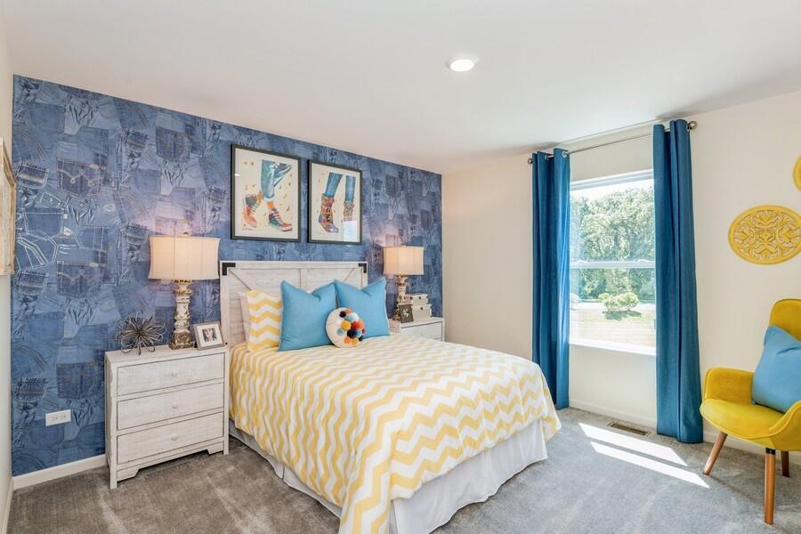 11290 Green Place Winfield, IN 46307 - Photo 7 of 27 a bedroom with a bed and wooden floor