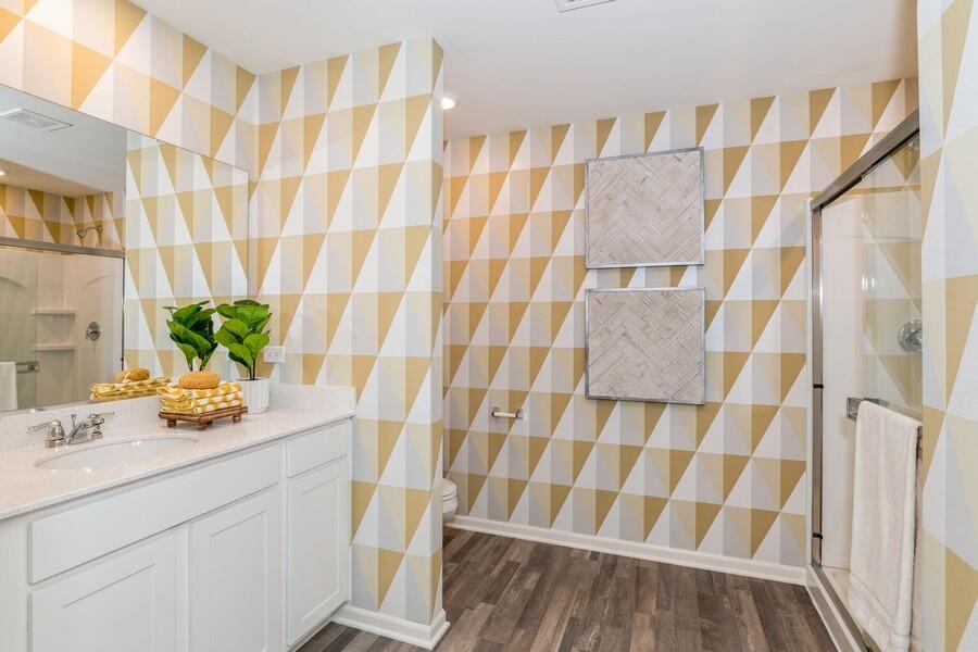 11290 Green Place Winfield, IN 46307 - Photo 9 of 27 a bathroom with a sink and a shower curtain