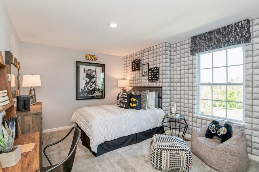 11290 Green Place Winfield, IN 46307 - Photo 10 of 27 a bedroom with a bed and wooden floor