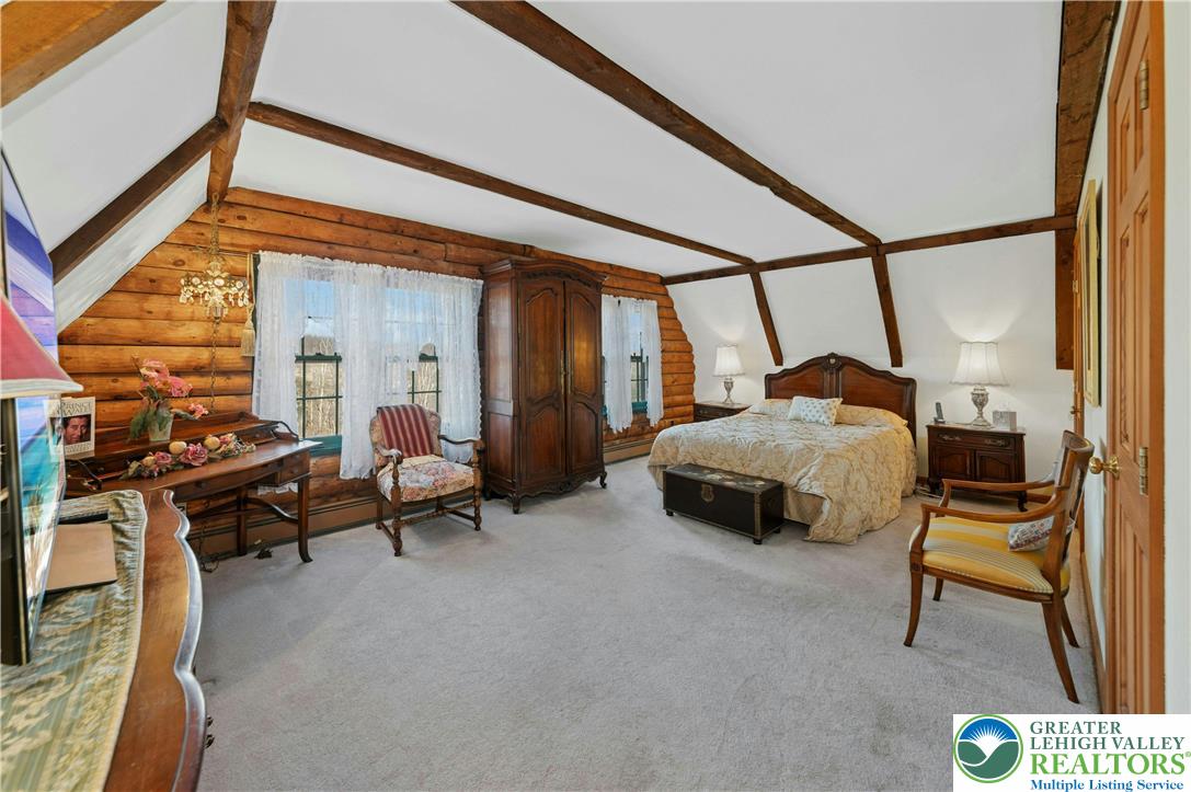 3980 Lehnenberg Road Riegelsville, PA 18077 - Photo 17 of 41 a bedroom with furniture and a window