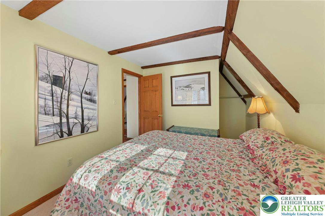 3980 Lehnenberg Road Riegelsville, PA 18077 - Photo 20 of 41 a bedroom with a bed and a window