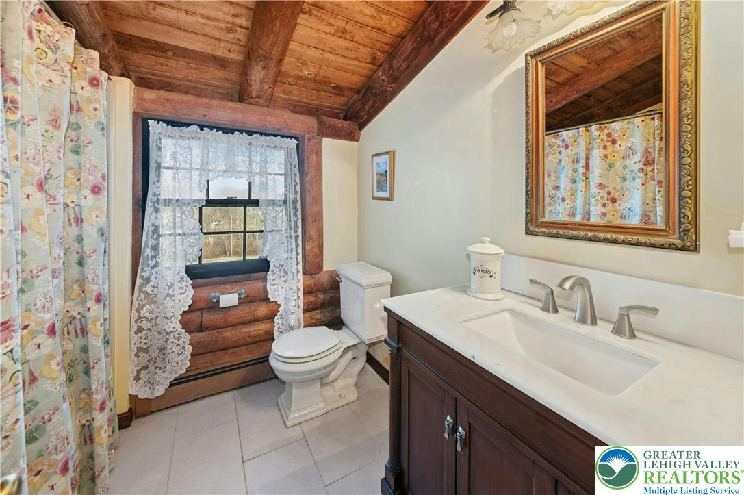 3980 Lehnenberg Road Riegelsville, PA 18077 - Photo 22 of 41 a bathroom with a sink toilet and shower