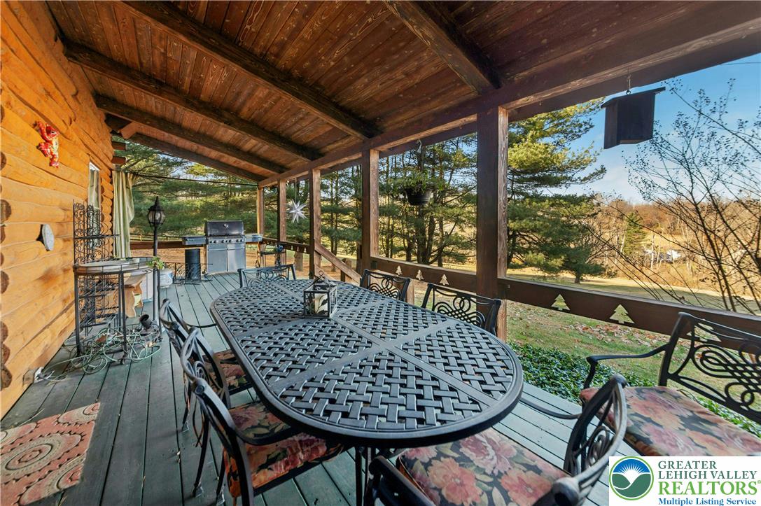 3980 Lehnenberg Road Riegelsville, PA 18077 - Photo 28 of 41 a view of a chairs and table in the balcony