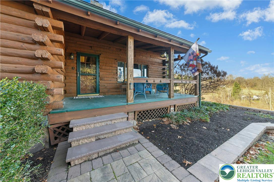 3980 Lehnenberg Road Riegelsville, PA 18077 - Photo 5 of 41 a view of a house with a porch