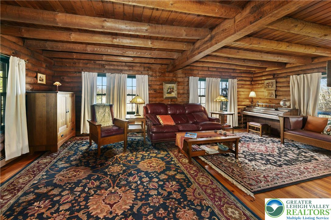 3980 Lehnenberg Road Riegelsville, PA 18077 - Photo 8 of 41 a living room with furniture and a rug