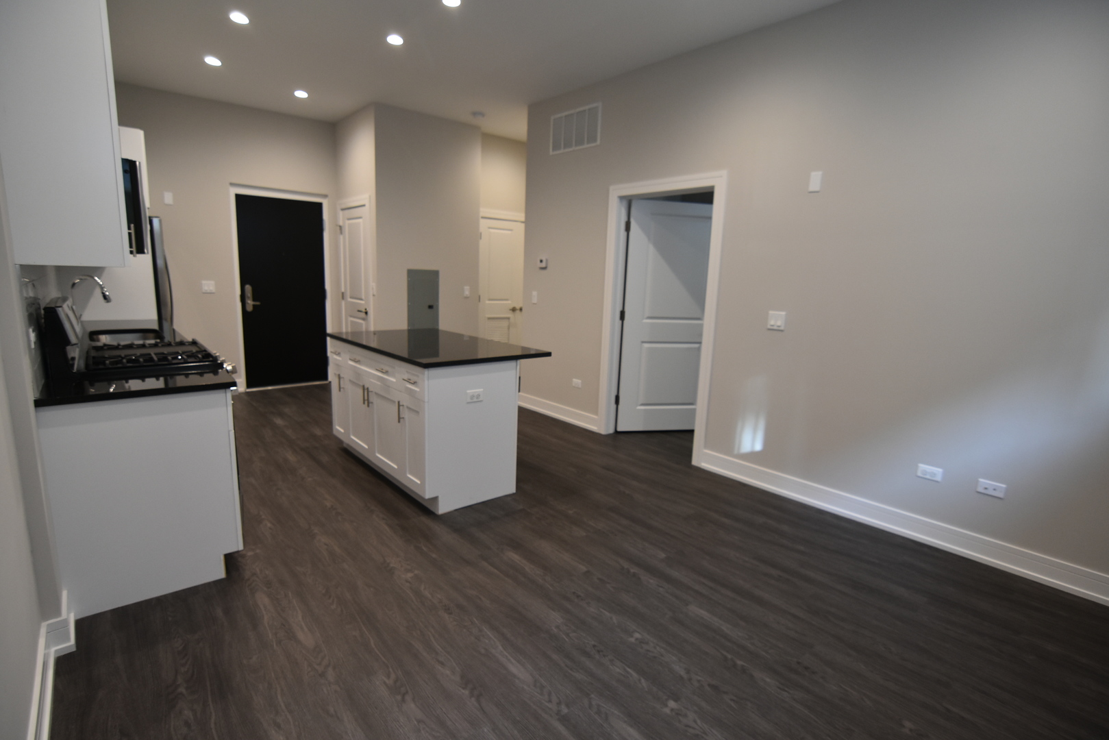 1730 West Greenleaf Avenue, Unit 102 Chicago, IL 60626 - Photo 5 of 15 a kitchen with a sink and a refrigerator