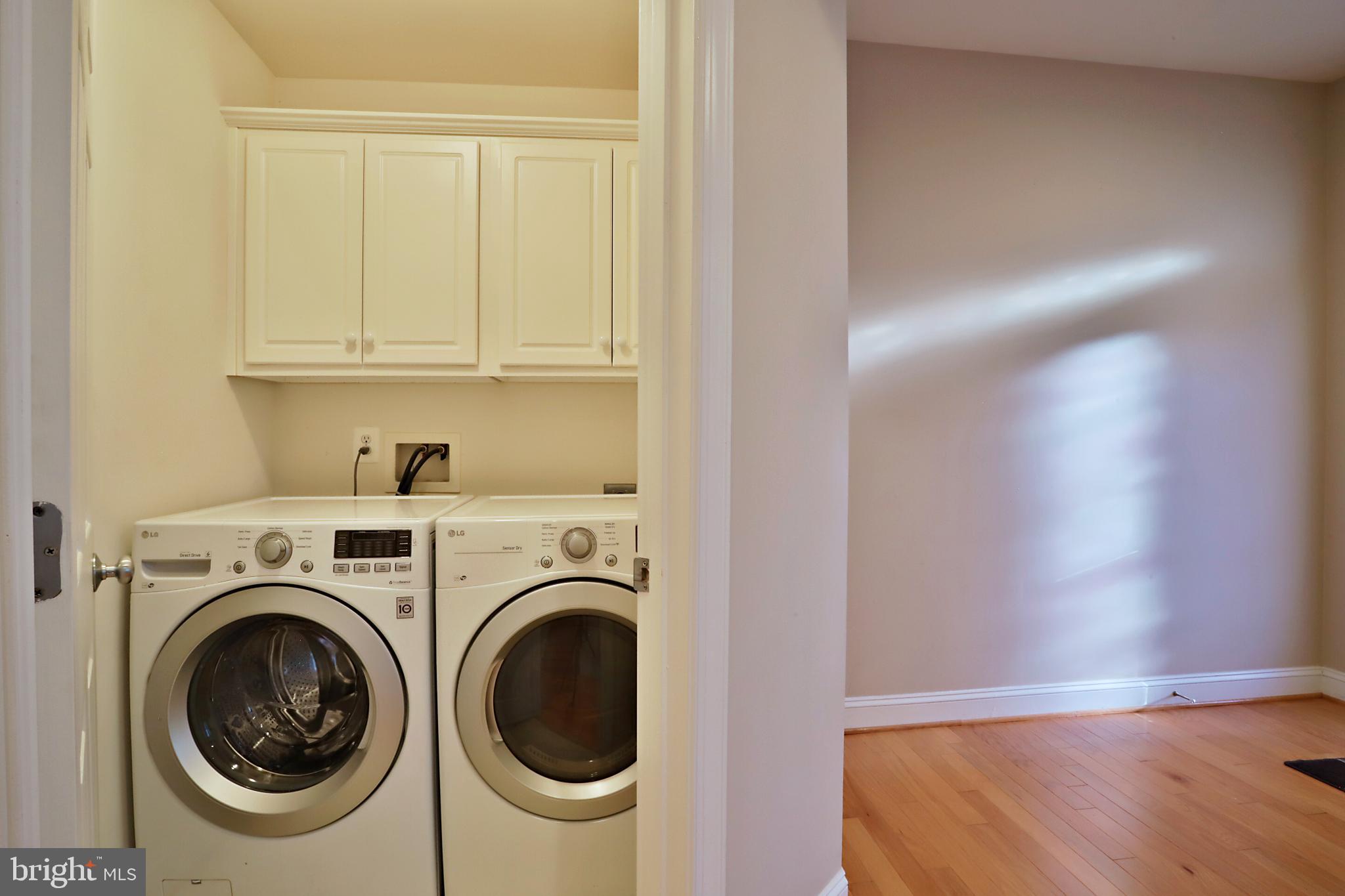 135 Fortnightly Boulevard Herndon, VA 20170 - Photo 18 of 29 a view of storage and utility room with washer and dryer