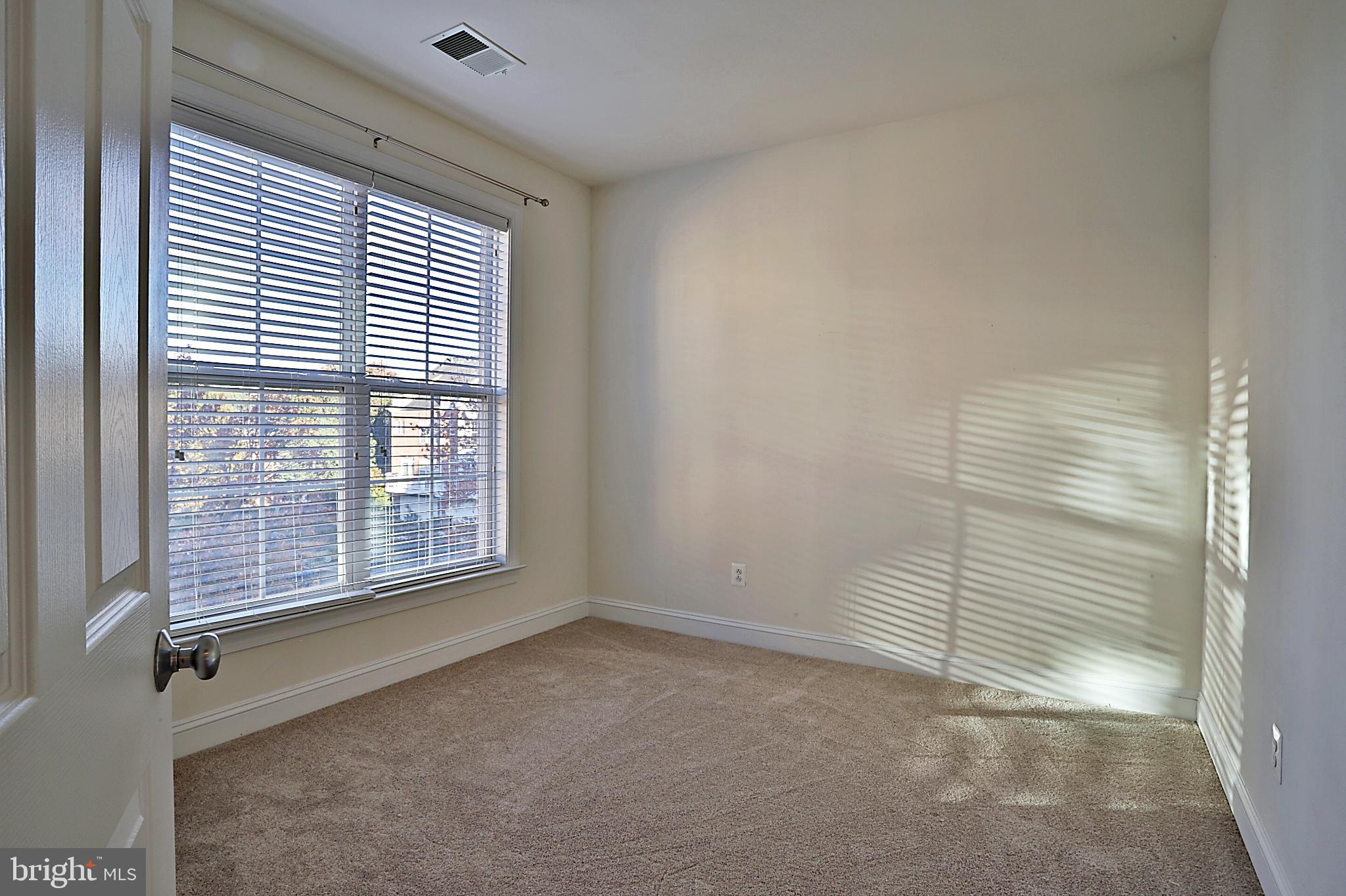 135 Fortnightly Boulevard Herndon, VA 20170 - Photo 24 of 29 a view of an empty room with a window