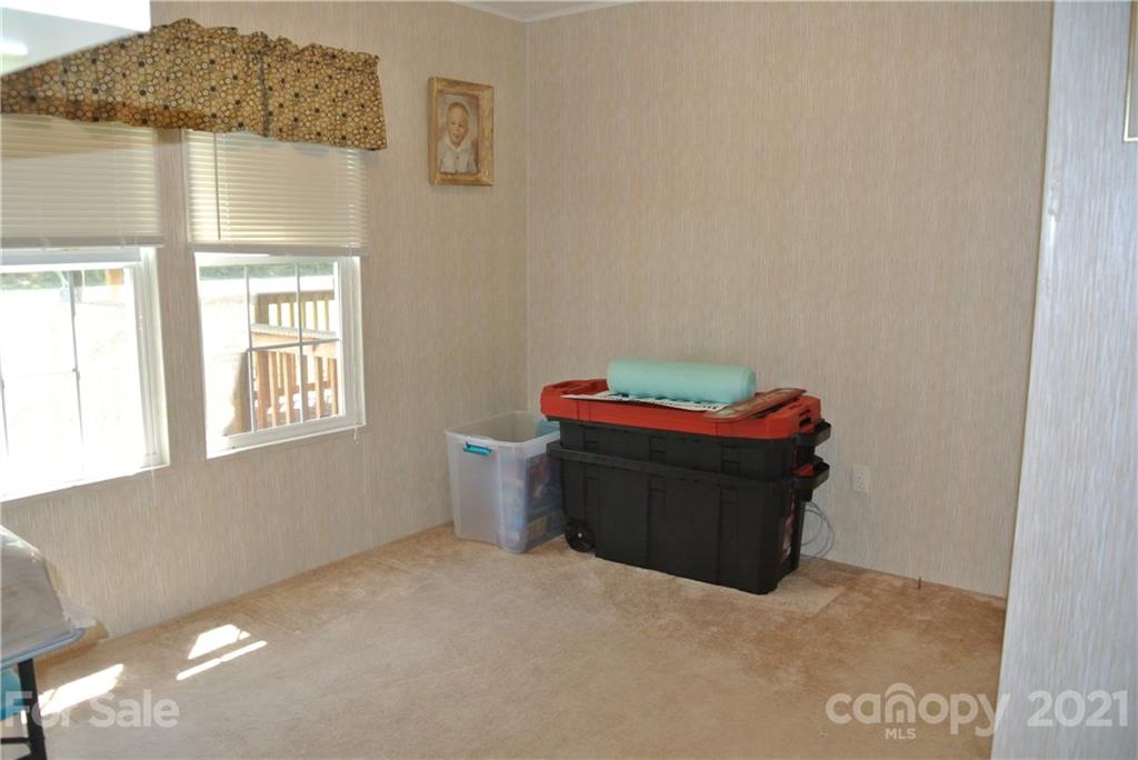 475 West V Thompson Road Rutherfordton, NC 28139 - Photo 17 of 46 a room with a window and shelf