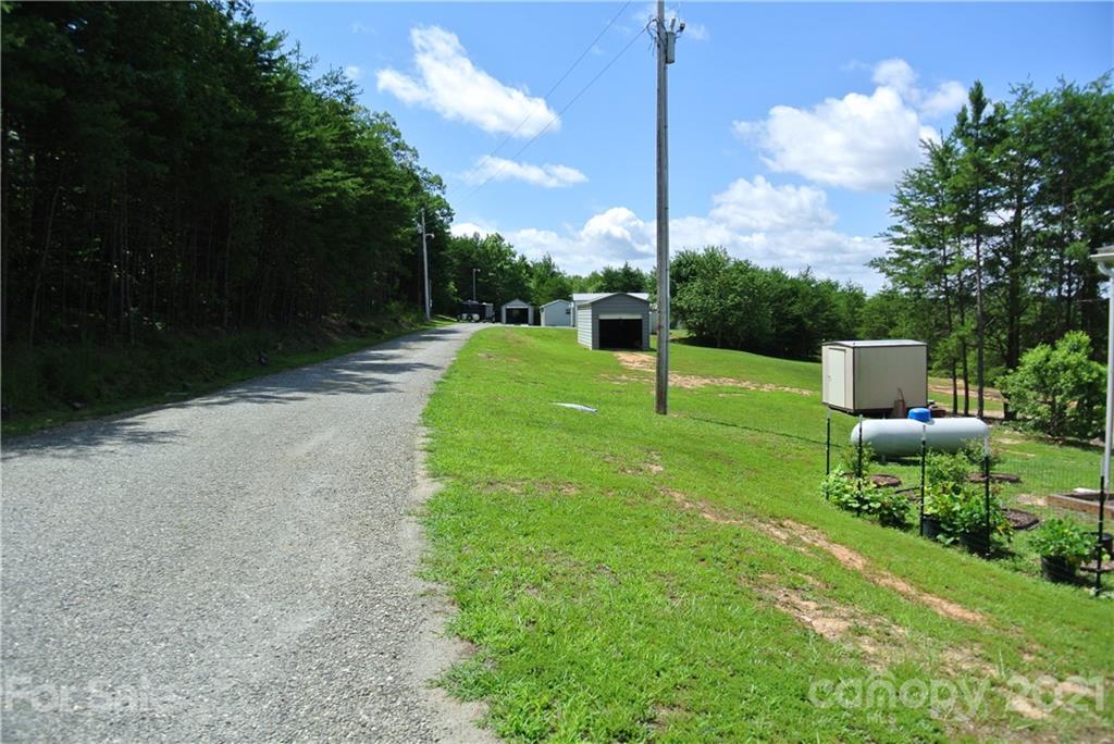 475 West V Thompson Road Rutherfordton, NC 28139 - Photo 22 of 46 a view of a garden with a slide