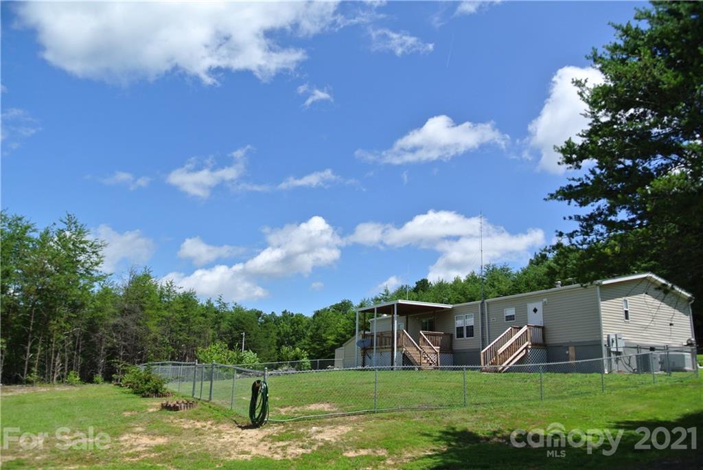475 West V Thompson Road Rutherfordton, NC 28139 - Photo 23 of 46 a view of a garden with large trees