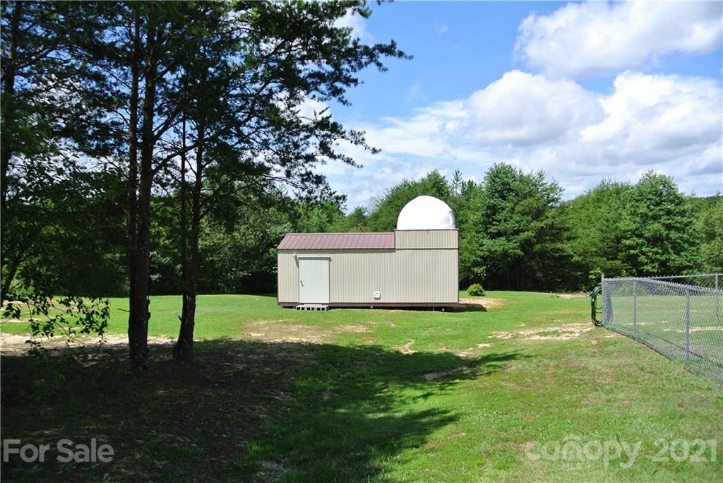 475 West V Thompson Road Rutherfordton, NC 28139 - Photo 26 of 46 a view of a tiny house with a backyard