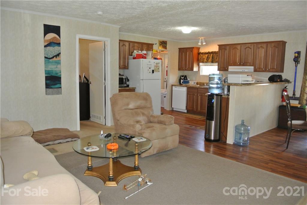 475 West V Thompson Road Rutherfordton, NC 28139 - Photo 8 of 46 a living room with furniture and kitchen view