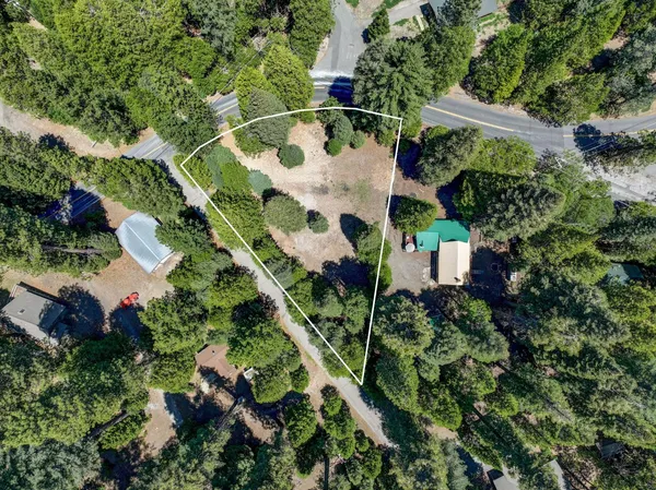 an aerial view of residential house with outdoor space