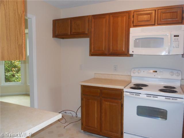 Kitchen. Ample cabinet and counter space for the cook to prepare meals.