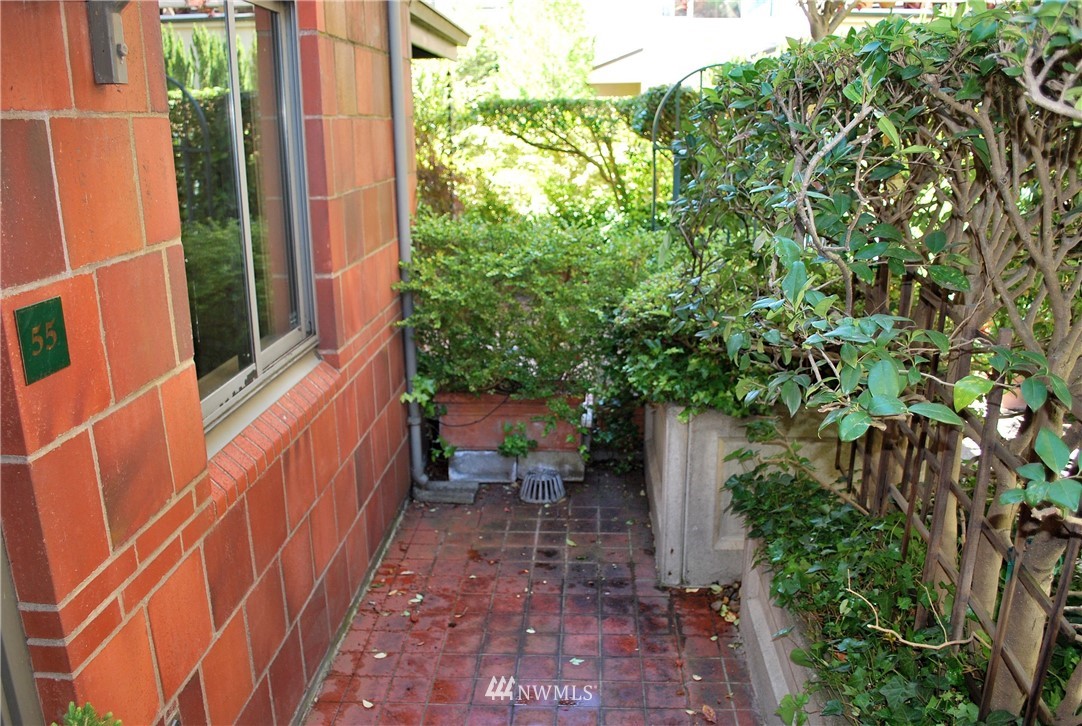 2021 1st Avenue, Unit 55 Seattle, WA 98121 - Photo 2 of 20 a view of a pathway with an outdoor space