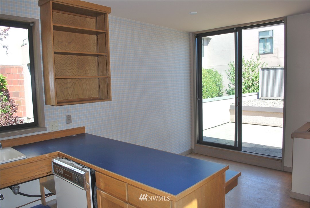 2021 1st Avenue, Unit 55 Seattle, WA 98121 - Photo 15 of 20 a view of room with a window