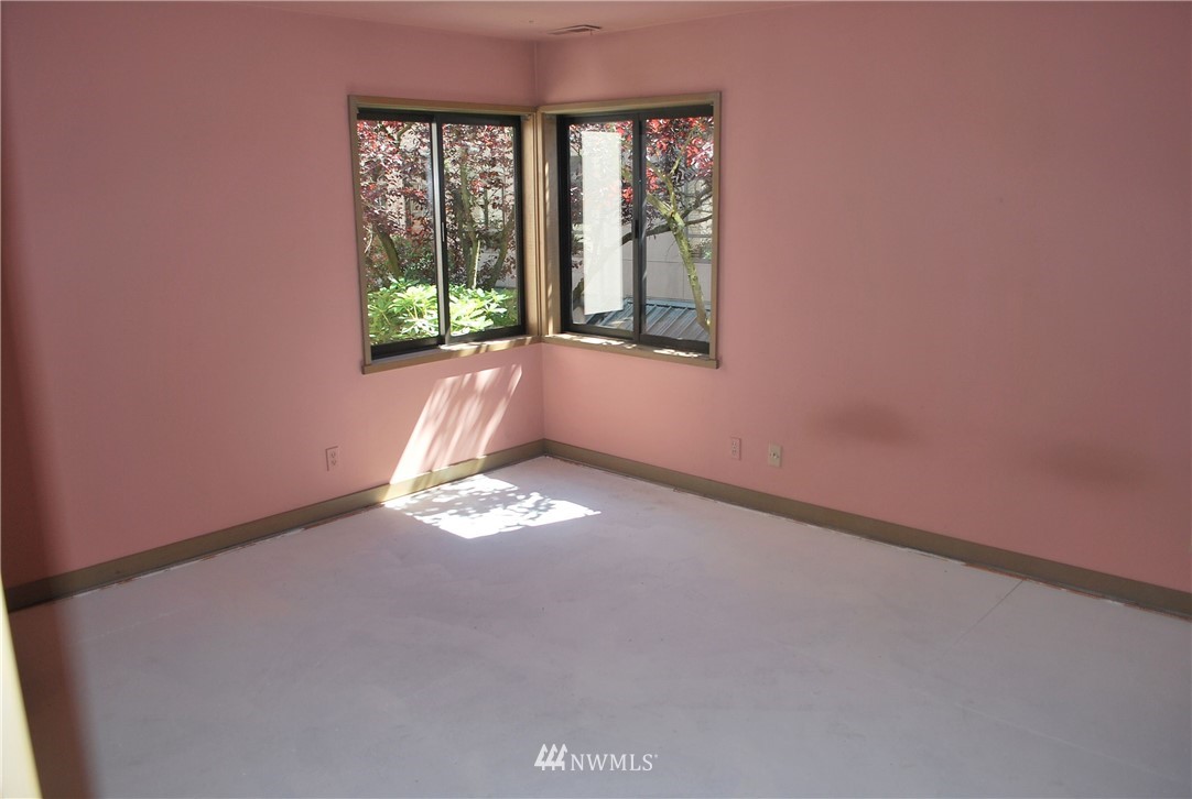 2021 1st Avenue, Unit 55 Seattle, WA 98121 - Photo 4 of 20 a view of empty room with window