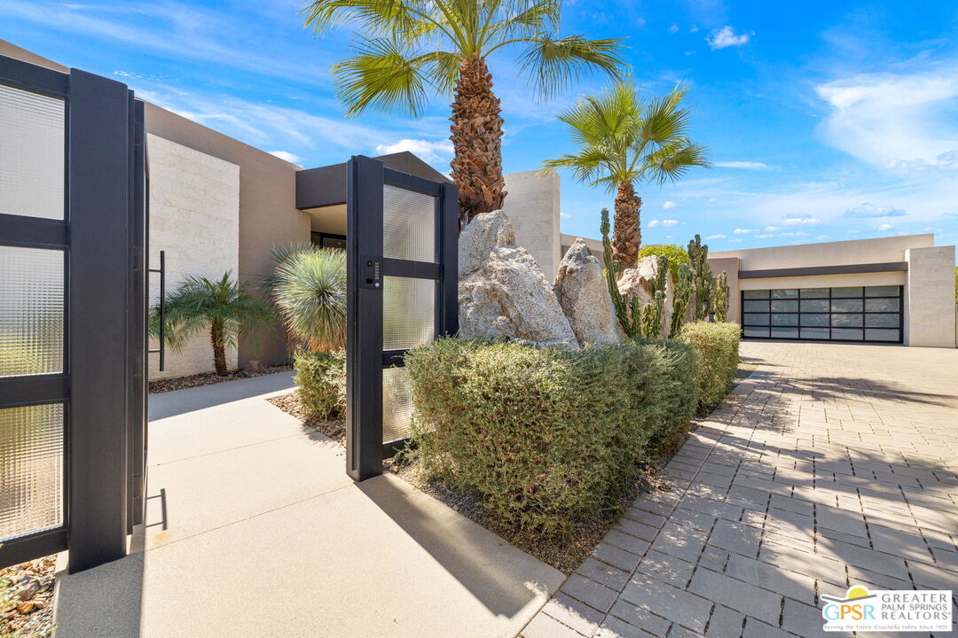 1 Sterling Ridge Drive Rancho Mirage, CA 92270 - Photo 11 of 51 a view of a house with a patio
