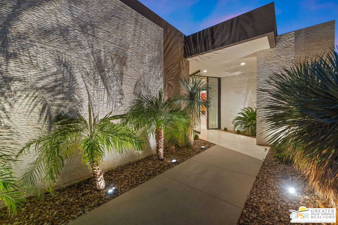 1 Sterling Ridge Drive Rancho Mirage, CA 92270 - Photo 12 of 51 a potted plant sitting in front of a building