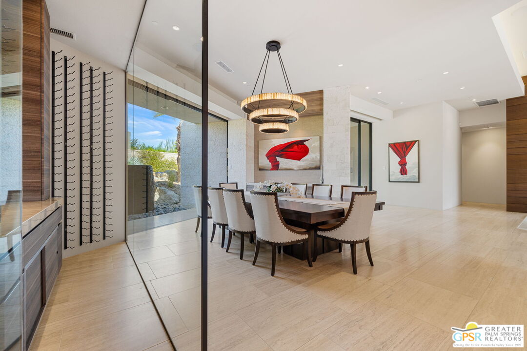 1 Sterling Ridge Drive Rancho Mirage, CA 92270 - Photo 17 of 51 a room with furniture and a chandelier