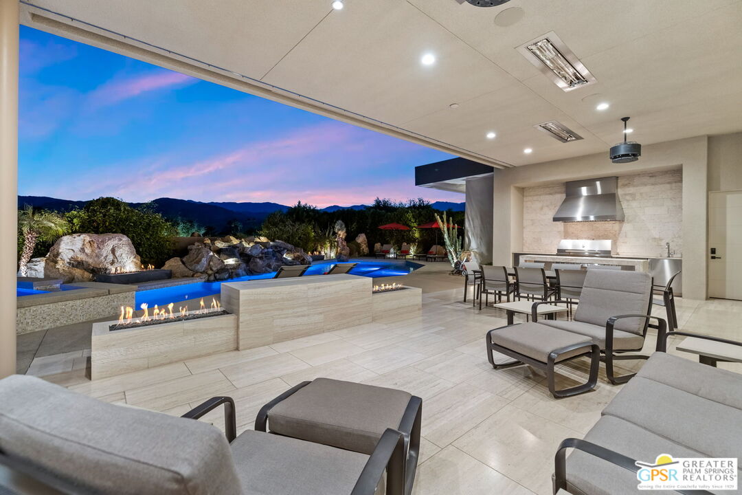 1 Sterling Ridge Drive Rancho Mirage, CA 92270 - Photo 23 of 51 a view of a lobby with furniture and a fire pit