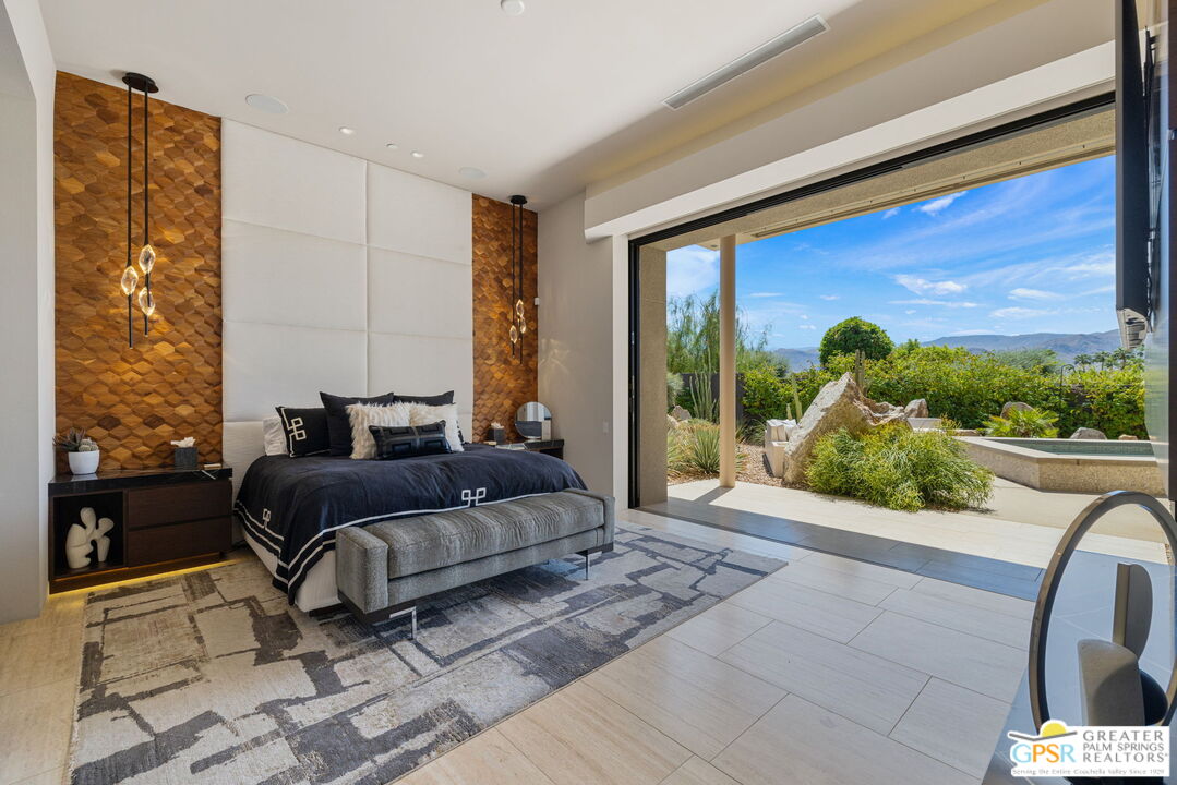 1 Sterling Ridge Drive Rancho Mirage, CA 92270 - Photo 39 of 51 a living room with furniture and a floor to ceiling window