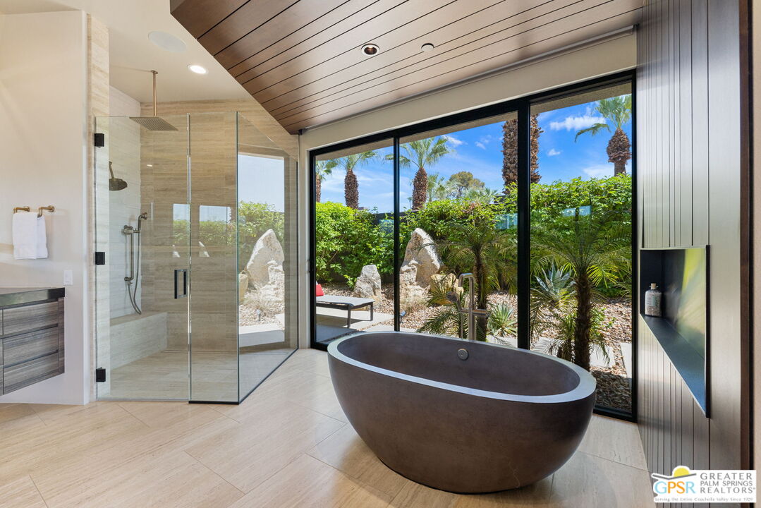 1 Sterling Ridge Drive Rancho Mirage, CA 92270 - Photo 41 of 51 a living room with large windows